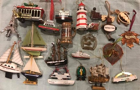 Pick up an ornament at each place you visit during your travels. The best part is sitting around the tree each Christmas talking about your memories of the trip.