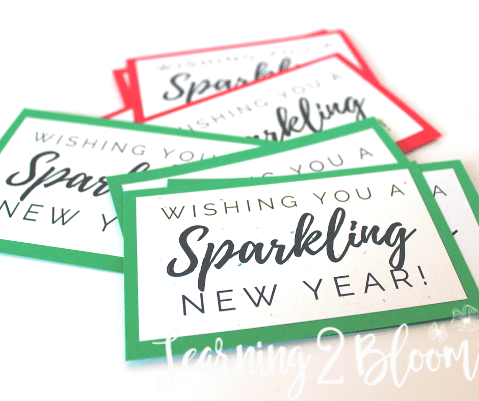 gift cards that say "wishing you a sparkling new year" on red and green cardstock